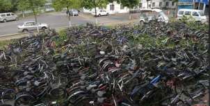 四川大学惊现“自行车墓地”3000多辆自行车被遗弃校园